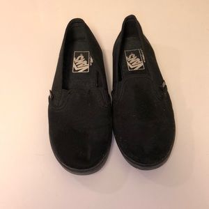 Black low rise slip on vans